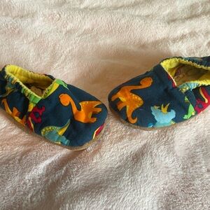 Custom made dinosaur slippers with fleece lining